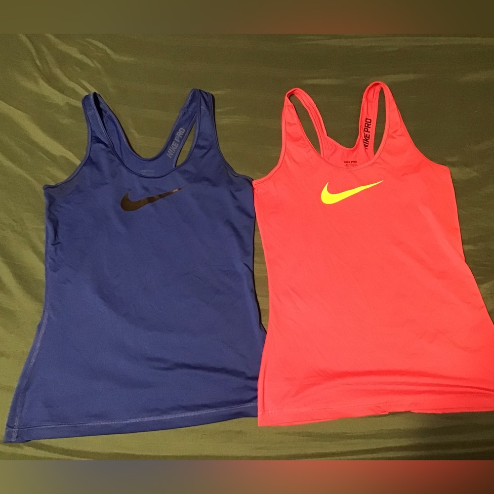 Razor back Nike dri-fit tank tops. (Selling both together).